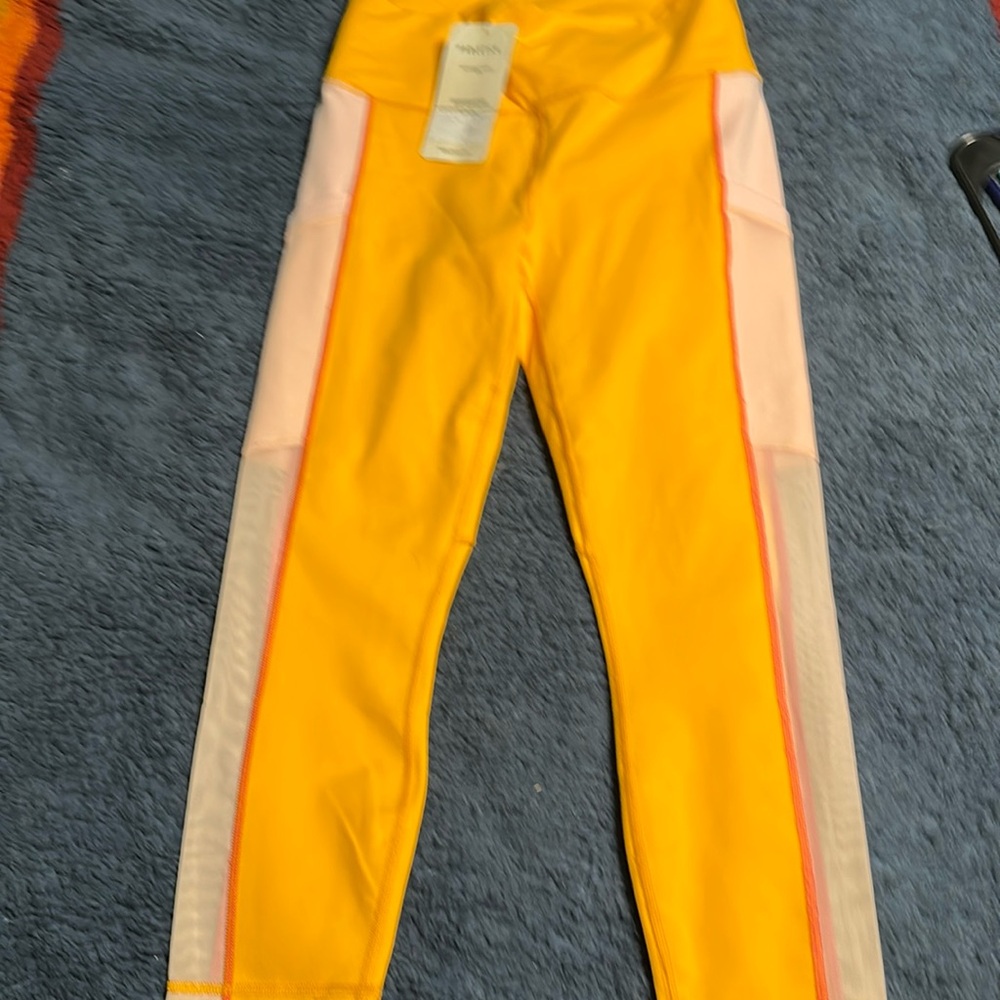 Fabletics powerhold on-the-go high waisted capri pants.  medium  orange pink